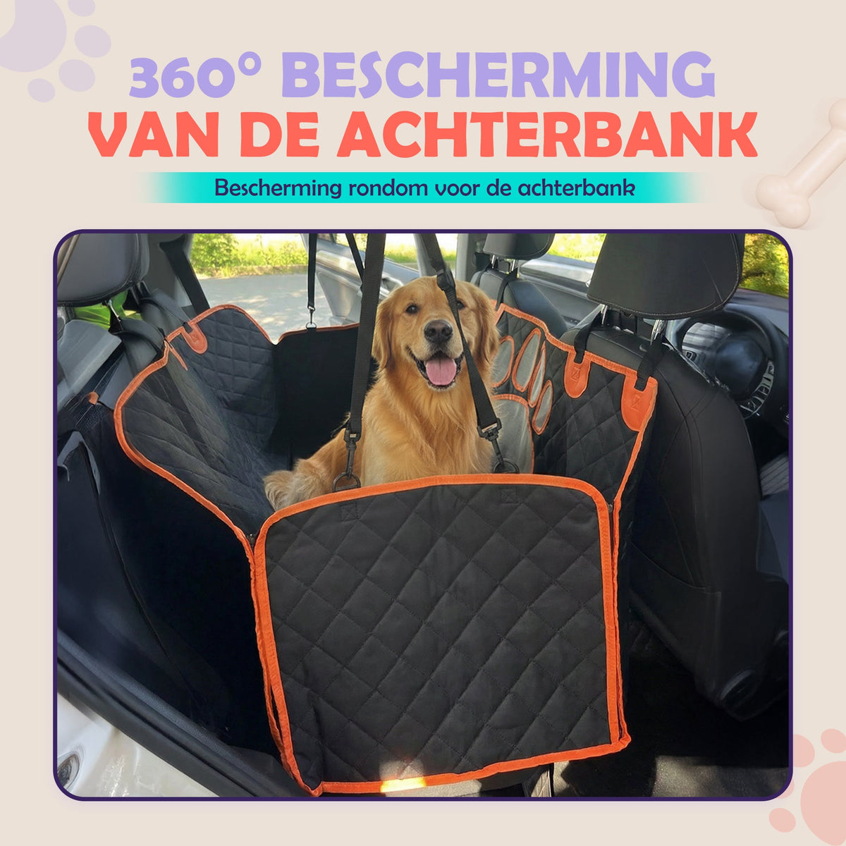 Golden retriever zit in de zwarte Robustrise-hondendeken met oranje rand, die als hangmat tussen de hoofdsteunen hangt